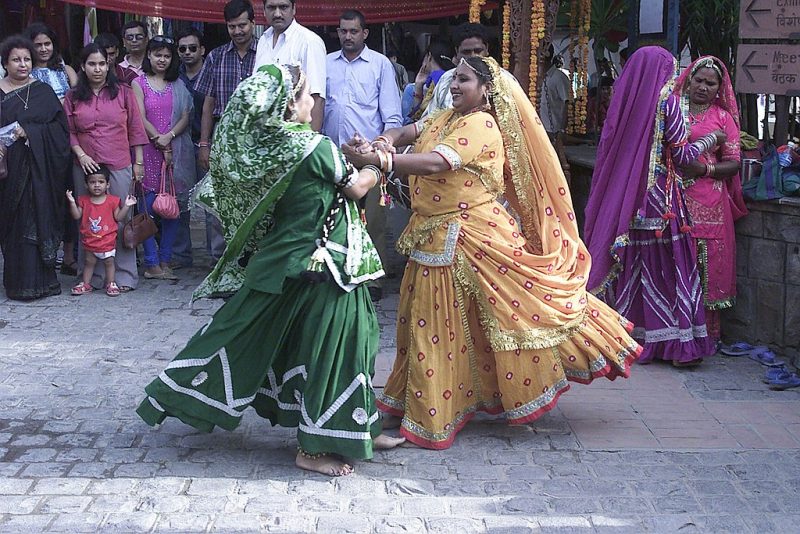 Rajasthani folk dancers performing during the Teej festival