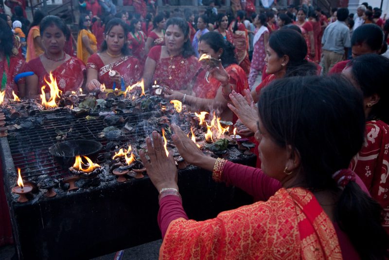 The ritual of puja being performed during Teej