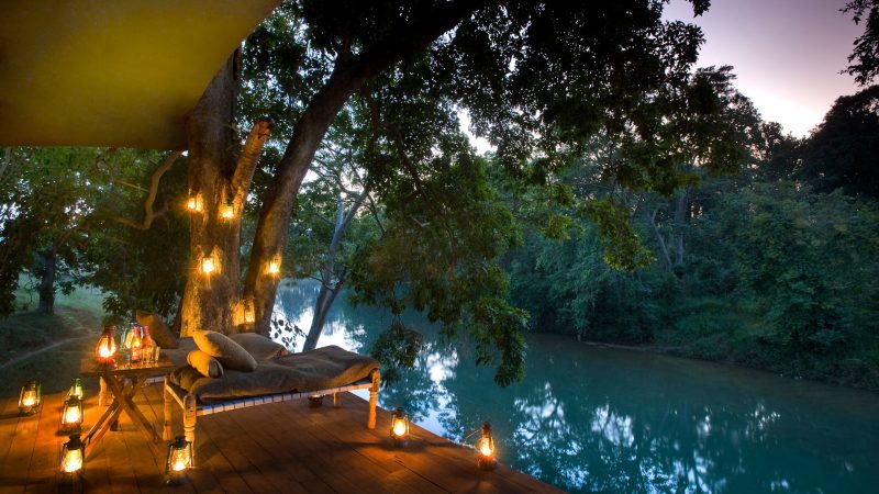 The spacious deck of Banjaar Tola Lodge