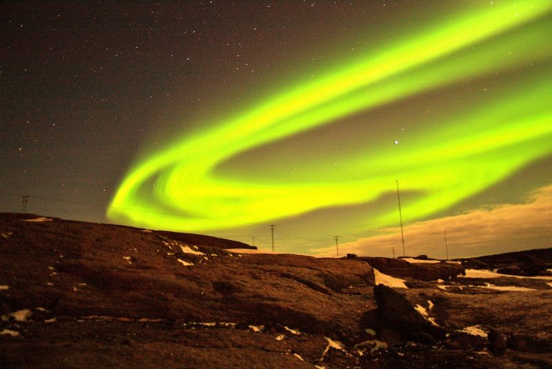 The northern lights dances across Greenland's sky